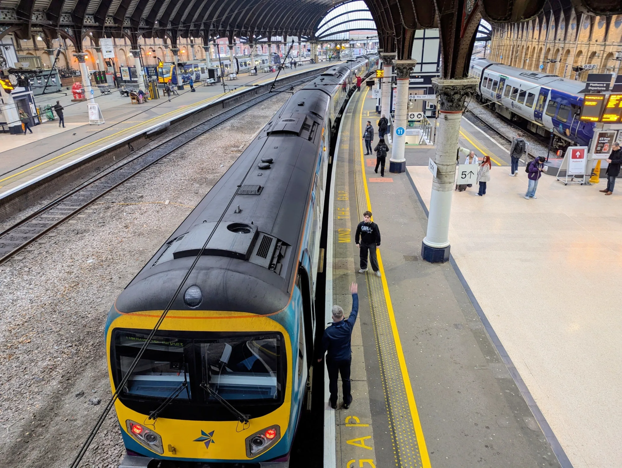 Exterior view of Leeds City Station, a major transport hub in the city centre.